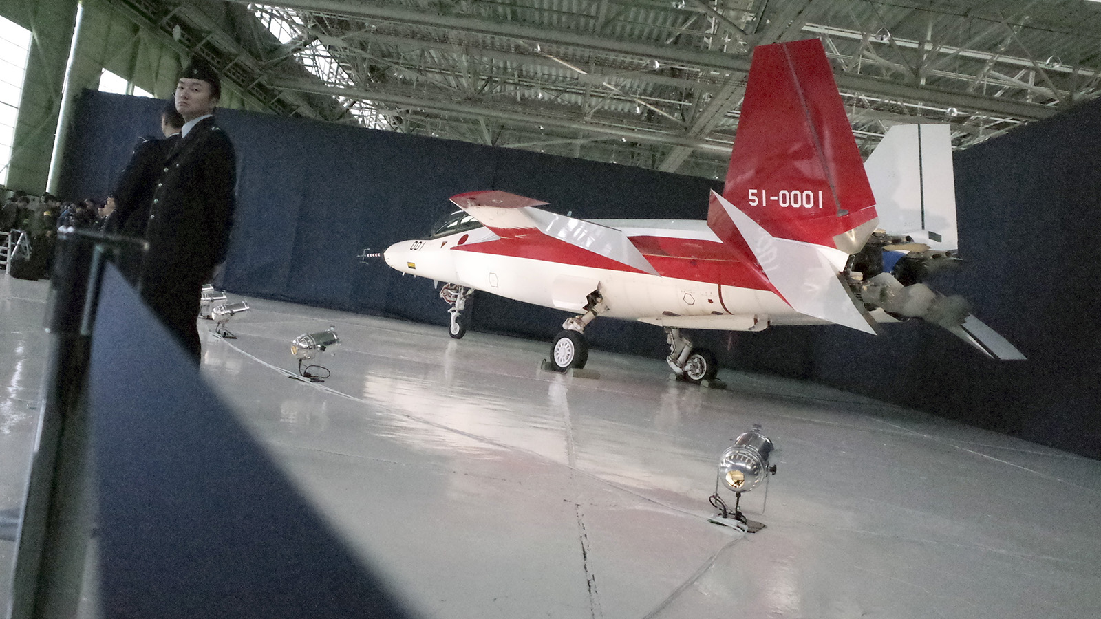 The first domestically-made stealth aircraft, X-2, sits in a hangar at Nagoya Airport in Toyoyama town, central Japan, Thursday, Jan. 28, 2016. The demonstration plane is expected to make its maiden flight sometime after mid-February. A Defense Ministry official said the technology will give Japan the option of developing its own stealth fighter jets in the future. (AP Photo/Emily Wang)