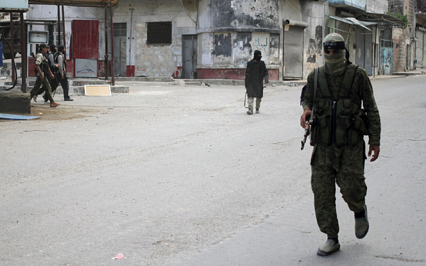 Jabhat al-Nusra fighters in the northwestern city of Ariha, Idlib province 