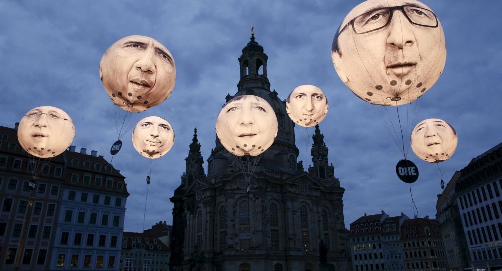 Balões com rostos de líderes dos países-membros do G7 perto da catedral de Frauenkirche, Dresde, em 27 de maio, dia da cúpula dos ministros das Finanças e chefes dos Bancos Centrais dos G7.