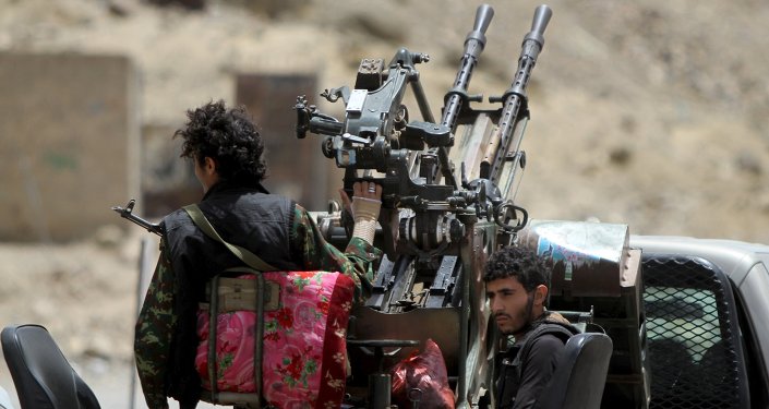 Houthi militants ride in a patrol truck in Sanaa May 2, 2015