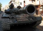 Syrian T-72 tank passes through the South