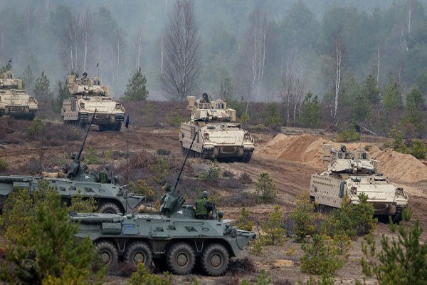 NATO Justifies Military Buildup